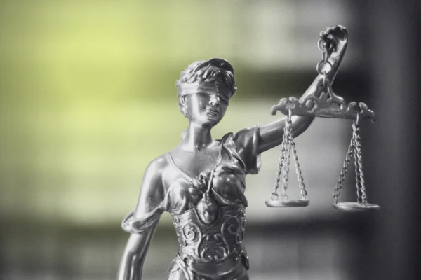 Statue of Lady Justice holding her scales