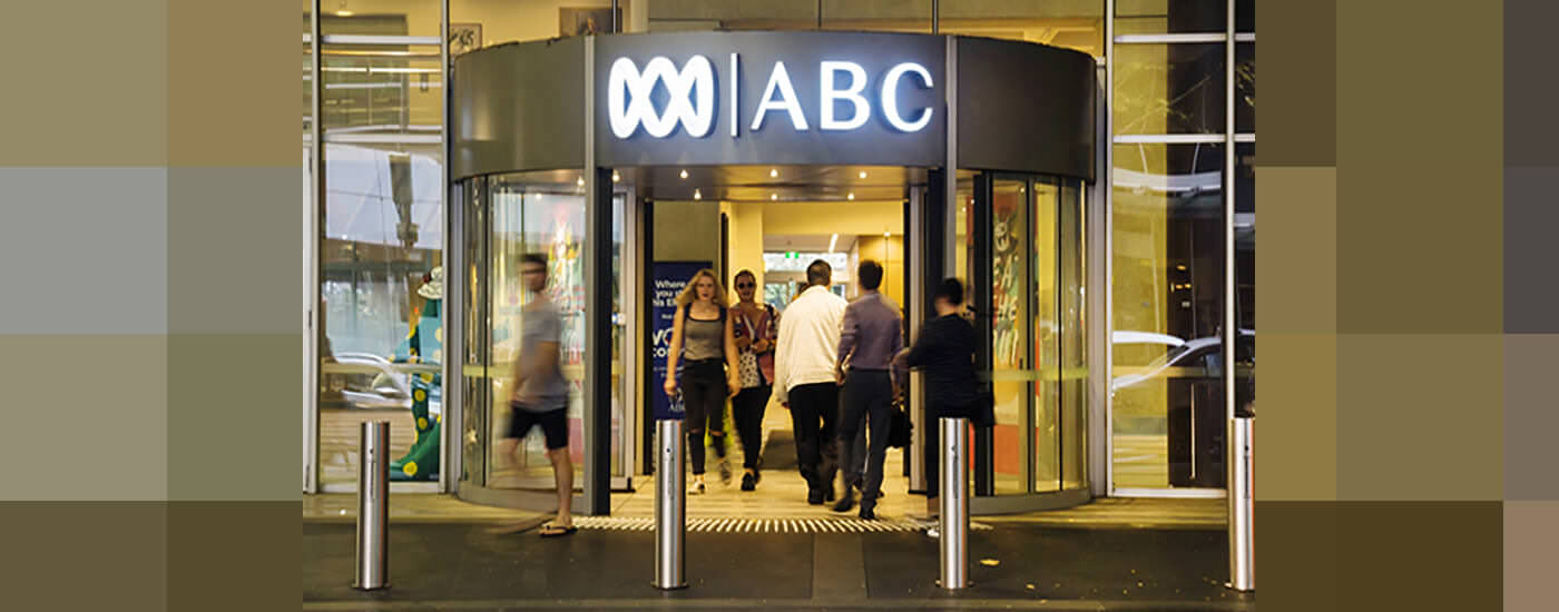 Individuals leaving the office building of ABC