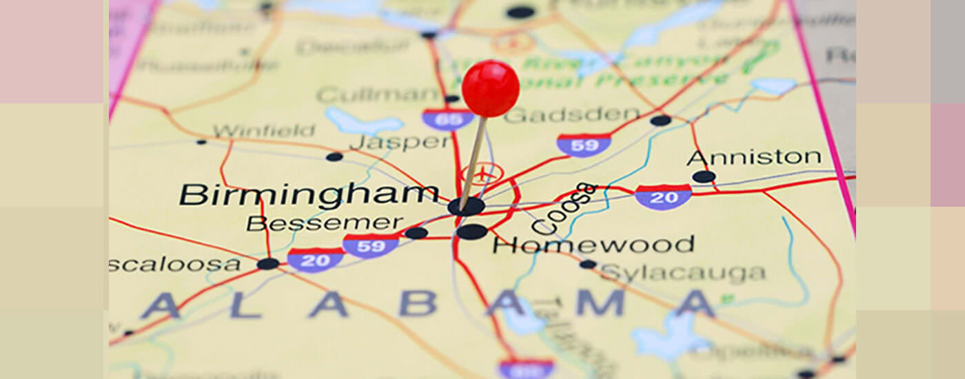 A map of Alabama with a pin on Birmingham