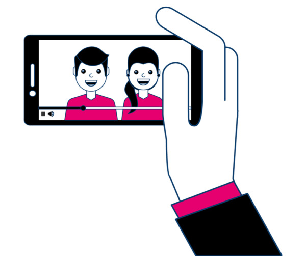 A hand holding a smartphone with a video playing on it: two smiling people stand side by side