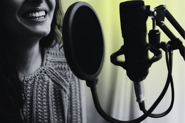 Image of woman in front of microphone