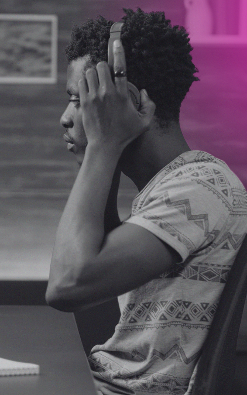 person putting on headphones