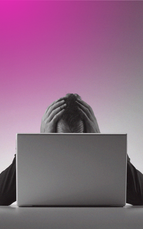 frustrated person at laptop