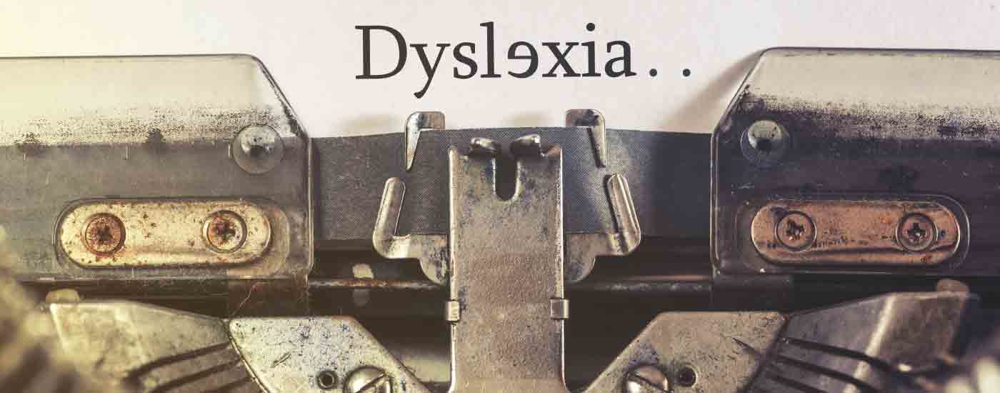 Dyslexia written on a type writer. the e is facing the other way