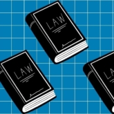 Law books on checkered background