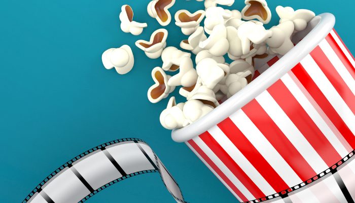 movie theater popcorn and film reel