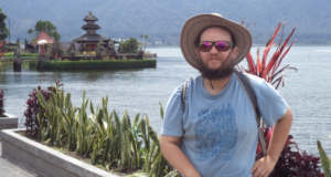 Tony poses in front of Lake Bratan in Bali, Indonesia