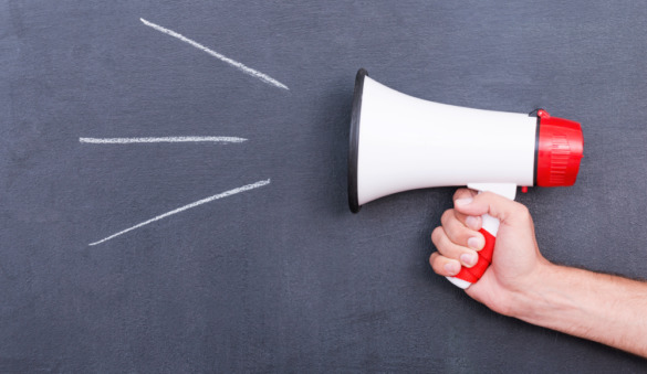 hand holding a megaphone