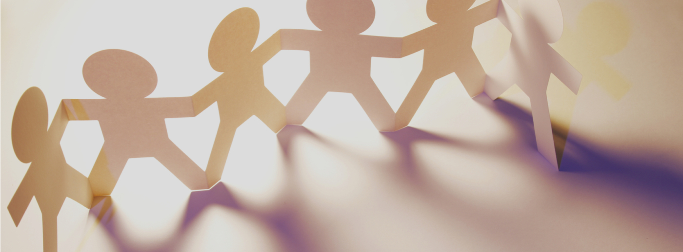 Paper cutout in the shape of people