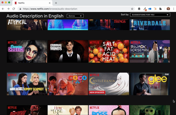 From netflix.com/browse/audio-description, select play on a title. Once the video plays, select the button at the bottom right corner of the screen and click on English - Audio Description