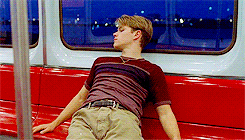 a 2 second gif of Matt Damon from Good Will Hunting looking bored on a red line train